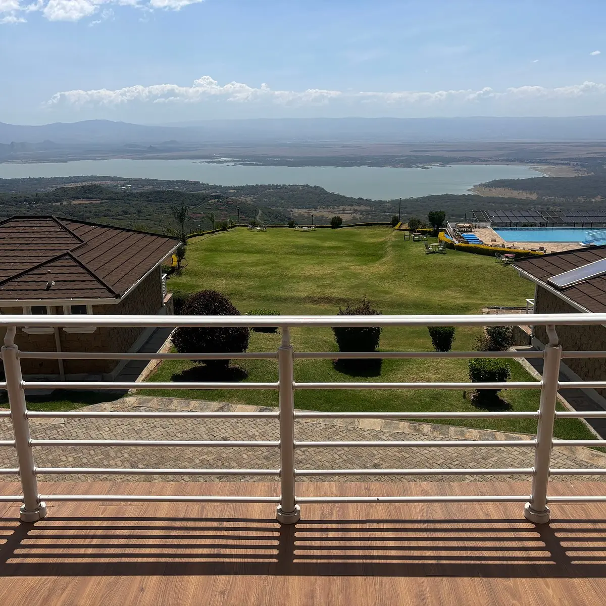 Luxury lodge overlooking a lake and landscaped grounds